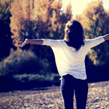 RHP Stock Grateful Woman Arms Open Trees